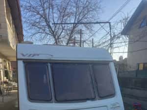Rulota coachman Vip( sunt venit in Tara )
