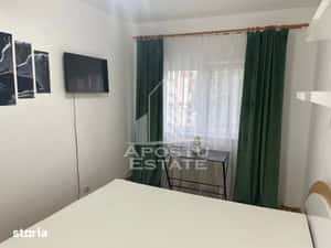 Apartament cu 2 camere, de inchiriat, zona Dambovita, Centrala proprie — miniatura 5