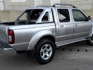 Nissan Navara D22 4x4 2003 2.5d 133 cp fara rugina — miniatura 10