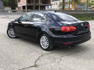 VW Jetta an fabricatie 2012 motor 2.0 tdi 140cp climatronic navigatie piele trapa jante aliaj — miniatura 4