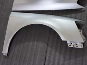 Aripa Vw Passat b6 gri negru maro albastru — miniatura 3