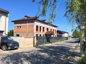 Domnesti - cladire 319 mp util, 2x garaj, ideal comercial