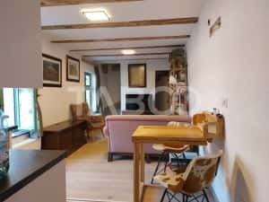 Apartament de vanzare 105 mp 3 camere curte 340 mp in acte Cisnadie