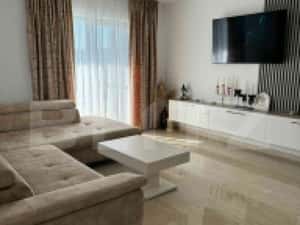 Apartament cu 3 camere in suprafata de 110 si un teren de 400 mp