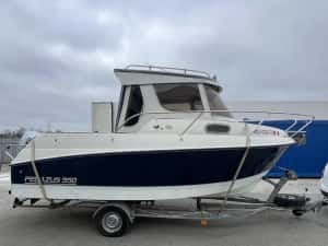 Ambarcatiune Pegazus 550 cabinata; motor honda 150; — miniatura 1