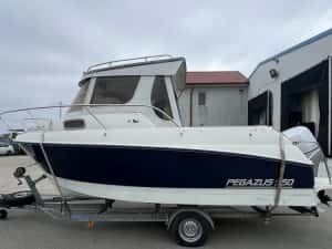 Ambarcatiune Pegazus 550 cabinata; motor honda 150; — miniatura 2