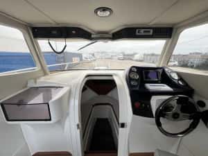 Ambarcatiune Pegazus 550 cabinata; motor honda 150; — miniatura 7