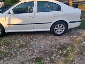 Vand Skoda 2009 Benzina 1600 cmc Neavariata — miniatura 3