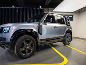 Land Rover Defender 110 3.0D I6 MHEV AWD X-Dynamic SE – Eiger Grey — miniatura 6