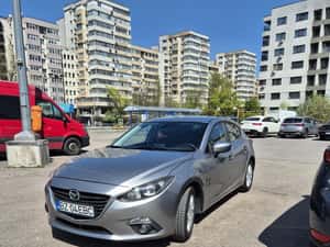 Mazda 3 Hatchback manuală 100 HP Benzină 2014
