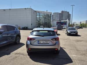 Mazda 3 Hatchback manuală 100 HP Benzină 2014 — miniatura 2