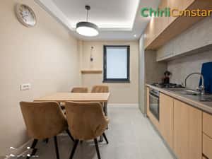 Apartament cu 3 camere și 2 băi · mobilat premium · bloc nou, parcare