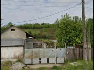 Casa si teren POTMELȚU  ( CRAIOVA )1200 MP la strada — miniatura 2