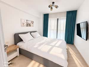 Studio în bloc nou, zonă centrală – cu loc de parcare