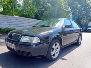 Skoda Octavia 2006 . 1.6 benzină .A.C. Jante .pachet drumuri grele Primul proprietar — miniatura 2