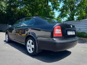 Skoda Octavia 2006 . 1.6 benzină .A.C. Jante .pachet drumuri grele Primul proprietar — miniatura 4