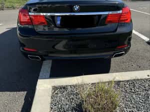 BMW 740 xDrive 2011 — miniatura 4