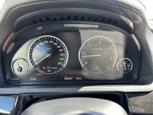 BMW 740 xDrive 2011 — miniatura 5