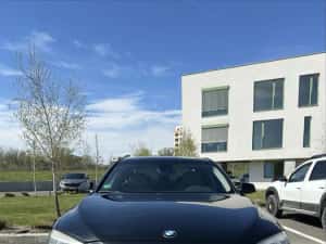 BMW 740 xDrive 2011 — miniatura 9