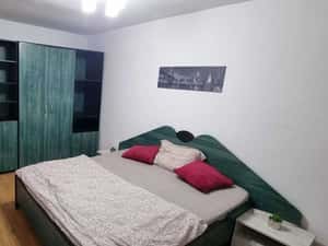 Dau in chirie apartament 2 camere mobilat — miniatura 2