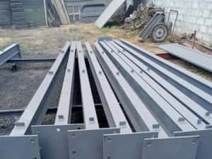 Vand hale metalice avem pe stoc asiguram transport si montaj rog serio — miniatura 5