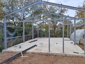 Vand hale metalice avem pe stoc asiguram transport si montaj rog serio — miniatura 8