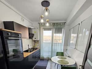 Apartament 2 camere decomandat, terasa 27 mp, 2 parcari, zona Terra — miniatura 4