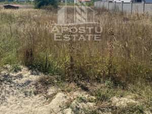 Teren 780 mp intre case - intrare Giarmata Vii