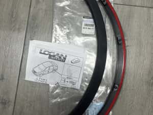 Ornamente protecție aripi(seceri late) spate Logan 2004-2013 originale — miniatura 1