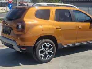 Dacia Duster 1.5 dci  model Prestigiu  4x4 — miniatura 3