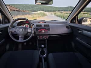 Suzuki Swift 1.3 benzină an 2009 177000km import Germania — miniatura 8