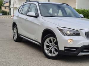 BMW X1 xDrive 2013 – SUV compact cu tracțiune integrală — miniatura 3