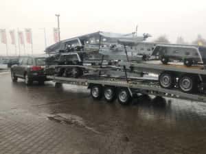 Remorci si platforme auto NOI, pret de importator!