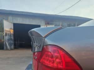 Eleron portbagaj BMW E90 – mic, tip lip