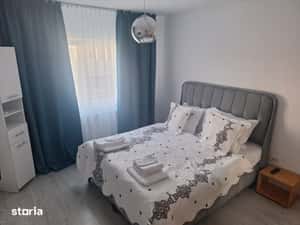 Apartament 3 camere, open space, 2 bai, parcare, confort și securitare — miniatura 4