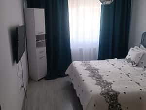 Apartament 3 camere, open space, 2 bai, parcare, confort și securitare — miniatura 6