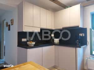 Apartament de vanzare 105 mp 3 camere curte 340 mp in acte Cisnadie — miniatura 4
