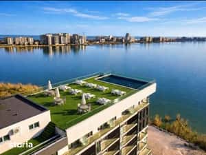 Apartament cu vedere catre lac in complex cu piscina privata si sala d — miniatura 4