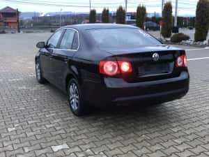 VW Jetta an 2010 motor 1.6 tdi 77kw 105 cp clima navigatie  parktronic jante aliaj — miniatura 3