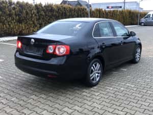 VW Jetta an 2010 motor 1.6 tdi 77kw 105 cp clima navigatie  parktronic jante aliaj — miniatura 4