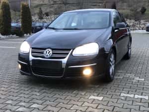VW Jetta an 2010 motor 1.6 tdi 77kw 105 cp clima navigatie  parktronic jante aliaj — miniatura 9