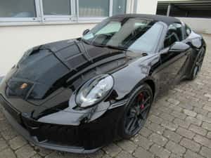 Porsche 992 Cabrio second-hand cu 9.999 km, 541 cp