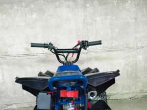Atv Renegade pe benzina pentru copii 49cc pornire la buton si sfoara — miniatura 2