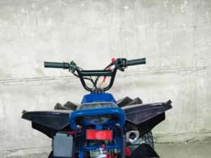Atv Renegade pe benzina pentru copii 49cc pornire la buton si sfoara — miniatura 10