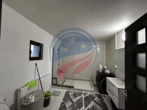 Casă spațioasă P+1+M pe teren de 902 mp – ideală pentru familie — miniatura 10