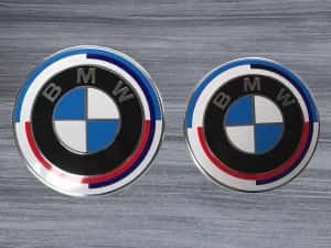 Set 7 Embleme Aniversare BMW 50 de ani Capota Portbagaj Jante si Volan — miniatura 5