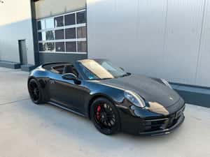 Porsche 992 Cabrio 480 cp, 13.500 km, automată — miniatura 2