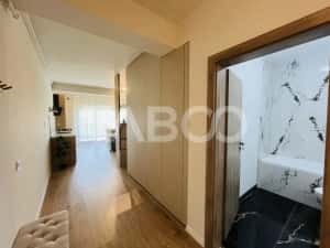 Garsoniera 38 mp cu terasa - incalzire in pardosea si aer conditionat — miniatura 4