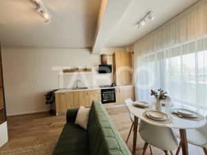 Garsoniera 38 mp cu terasa - incalzire in pardosea si aer conditionat — miniatura 5