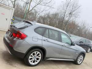 BMW X1 2010, 2.0 Diesel, 143 CP, Automată, 267.015 km — miniatura 4